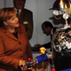 Image for article titled Why Is Angela Merkel Always Palling Around With Robots?